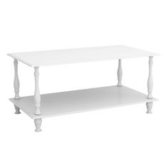 a white coffee table with two shelves on each side