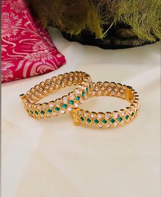 Handmade Gold Bangles/Wedding Bangles/New bangles/Gold Bracelet/Kundan Bangles/Bridal Bangles/Stone Bangles/Punjabi Kada/Indian Jewelry Details :- Stone - Kundan Metal - Brass Quality - Fine Brass Metal  Closure:- Screw Type Plating:- Gold Plated Openable bangle in 22 k gold plating Beautiful Looks at One Glance - with Intricate gold plated creates Glamorous Reflections and adds Luxurious Looks. Ready to ship from Indian To measure the size of the bangle: Please refer to the size guide in the picture above.. Such intricate detailing in this Inspired Royal Bangles with Flawless Polki and Diamond work. Finest Kundan work . Highest quality and best craftsmanship Customized orders takes 3 to 4 weeks, depending on piece requirements. Creative Khandelwal Jewelry pieces can be customized in accor Luxury Kundan Bangle With Stone Work, Luxury Kundan Openable Bangle, Diwali Toe Ring With Stone Work, Kundan Toe Ring Jewelry For Weddings, Temple Style Chandbalis With Stone Work For Reception, Traditional Toe Ring Jewelry With Stone Work, Traditional Stone Work Toe Ring Jewelry, Traditional Hand Set American Diamond Bridal Sets, Traditional Stone Work Chandbalis For Reception