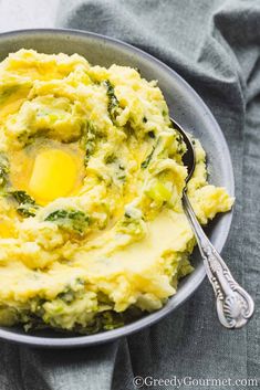 Creamy Colcannon served in a grey bowl.