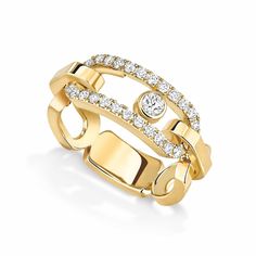 a yellow gold ring with diamonds on it