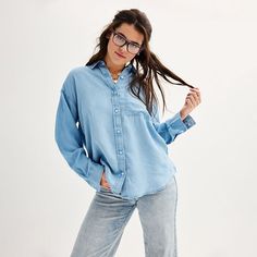 Refresh your wardrobe with this juniors' SO long sleeve oversized shirt. Click on this WOMEN'S GUIDE to find the perfect fit and more! FEATURES Woven construction 1 chest pocket Shirttail hem Button front Button cuffs Long sleevesFIT & SIZING Oversized fit 30-in. length from shoulder to hemFABRIC & CARE Cotton, tencel, viscose Machine wash and tumble dry low ImportedRESPONSIBLE Supports more sustainable cotton farming Size: X Large. Color: Light Wash Chambray. Gender: female. Age Group: kids. Ma Oversized Long Sleeve Casual Shirt, Relaxed Long Sleeve Everyday Shirt, Relaxed Long Sleeve Shirt For Everyday, Oversized Button-up Casual Shirt, Casual Oversized Button-up Shirt, Trendy Long Sleeve Shirt With Relaxed Fit, Relaxed Long Sleeve Cotton Shirt, Trendy Relaxed Fit Shirt With Shirttail Hem, Trendy Shirt With Relaxed Fit And Shirttail Hem