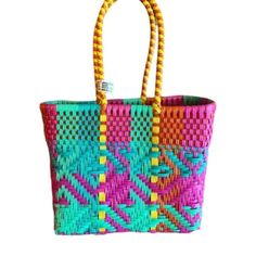 Brand New With Tags! About This Product Open Tote Style Size 10x8x4 Colors Colors - Fucsia, Mint, Turquoise, Orange And Yellow. Each Bag May Vary In Size And Small Color Detail Since They Are Handmade By Different Artisans. Our Bags Are Made From High Quality Pvc. This Makes Our Products Easy To Clean, Fold & Pack. They Are Light Weight And Don't Form Out Of Shape. Due To Its Unique Design Patterns And Materials, The Product Is Durable, Flexible And Will Last You A Very Long Time. Cheap Multicolor Woven Beach Bag, Colorful Rectangular Beach Bag, Woven Multicolor Rectangular Beach Bag, Eco-friendly Multicolor Beach Bag With Braided Handles, Eco-friendly Multicolor Beach Bag With Handles, Woven Tote Bag, Out Of Shape, Open Weave, Womens Tote Bags