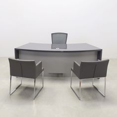 an office table with two chairs around it