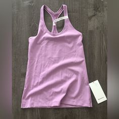 New With Tags. Size 8. Color Code Is Jubi Lavender Summer Activewear For Gym, Lavender Activewear For Gym In Summer, Purple Athleisure Tank Top For Sports, Purple Moisture-wicking Tank Top For Athleisure, Purple Moisture-wicking Athleisure Tank Top, Purple Moisture-wicking Tank Top For Sports, Purple Moisture-wicking Sports Tank Top, Functional Purple Racerback Activewear, Purple Racerback Tank Top For Athleisure