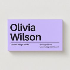 the business card is designed to look like it has been placed on top of a wall