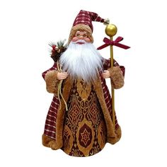 a statue of santa claus holding a staff