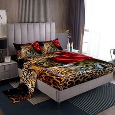 a leopard print bed spread in a bedroom