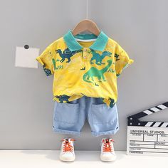 Spring / Summer 2 Pcs Clothing Set Dinosaur Design T-Shirt + Shorts - Pink & Blue Baby Shop - Review Cotton Dinosaur Print Sets With Short Sleeves, Cotton Sets With Dinosaur Print And Short Sleeves, Casual Green Dinosaur Print Sets, Casual Green Sets With Dinosaur Print, Summer Dinosaur Print Playtime Sets, Short Sleeve Dinosaur Print Tops For Playwear, Green Dinosaur Print Playwear Sets, Green Dinosaur Print Sets For Playwear, Kids Formal