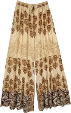 Brown flora print on wide-leg pants, which are soft and flowy, wide legs with a flair of a complementary graphic print.  The loose-fit wide-leg printed mix palazzo pants have a comfortable waist that will fit a small to a large. #tlb #SplitSkirtsPants #Printed #bohemianfashion #festivalpants Spring Patterned Wide Leg Printed Pants, Summer Patterned Wide Leg Bottoms, Summer Wide Leg Patterned Bottoms, Floral Print Ankle-length Harem Pants, Bohemian Wide Leg Patterned Bottoms, Bohemian Patterned Wide Leg Bottoms, Bohemian Wide Leg Bottoms With Floral Print, Bohemian Wide Leg Ankle-length Floral Pants, Bohemian Wide-leg Floral Print Bottoms