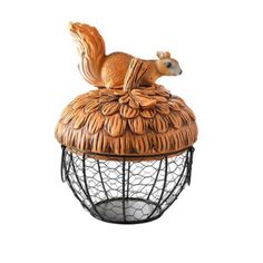 a squirrel sitting on top of a birdcage that is made out of wood