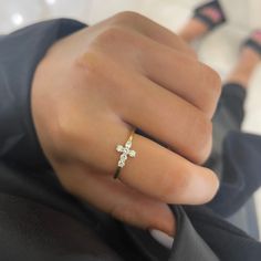 Our Little Grace Diamond Cross Ring is a twinkling token of faith. The intentional delicacy of this design makes for the heartfelt gift of a child's first piece of fine jewelry or an adult's everyday dainty wear. Metal: 18k White Gold / 18k Yellow Gold / 18k Rose Gold 6 Round Brilliant Cut Natural Diamonds: Approx. 0.24 ctw G/H Color and SI1-2 Clarity Diamonds Diamond Cross Ring For Gift, Diamond Cross Rings For Gifts, Cross-shaped Diamond Ring For Gift, 14k Gold Stackable Rings With Vvs Clarity For Gift, 14k Yellow Gold Cross Rings, Dainty Stackable Rings With Brilliant Cut As Gift, Gold Diamond Cross Ring, Gift Stackable Rings In Yellow Gold With Brilliant Cut, Gift White Gold Diamond Ring In 14k