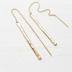 "These, sleek threader earrings feature gold filled bars measuring ~1.5\" from end to end they measure 4.5\" For more threader designs in sterling silver and yellow goldfill: https://www.etsy.com/shop/CamileeDesigns/search?search_query=threader . { p a c k a g i n g } . Your jewelry will arrive in a white paper snap box - perfect for giving or keeping for yourself. . { s h i p p i n g } . Camilee Designs is handmade in my studio in the bay area, California and shipped via USPS First-Class mail w Gold Nickel-free Threader Earrings, Minimalist Adjustable Yellow Gold Linear Earrings, Gold Adjustable Threader Earrings, Adjustable Long Drop Threader Earrings, Minimalist Metal Long Drop Threader Earrings, Gold Threader Earrings With Adjustable Chain, Long Drop, Adjustable 14k Gold Drop Threader Earrings, Adjustable 14k Gold Dangle Threader Earrings, Adjustable Gold Dangle Linear Earrings