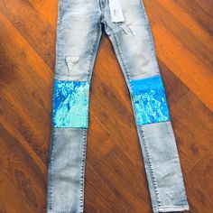 Manila Grace Distressed Denim Stretch Jeans With Blue Opal Embellished Sequin Knee. Great Way To Elevate Your Denim Luck Flattering Jeans New With Tags True To Size. Light Blue Distressed Fitted Jeans, Straight Leg Denim Bottoms With Sequins, Straight Leg Denim Sequined Bottoms, Straight Leg Denim Jeans With Sequins, Straight Leg Sequin Denim Jeans, Fitted Blue Denim Jeans, Sequined Straight Leg Denim Bottoms, Sequined Straight Leg Denim Jeans, Trendy Embellished Denim Jeans