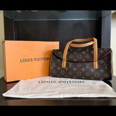 Louis Vuitton Sonatine Handbag. 100% Authentic. Preloved. Excellent Condition. Dustbag And Box Sold Separately High-end Monogram Canvas Bag For Formal Occasions, Formal Monogram Canvas Bag With Dust Bag, High-end Formal Monogram Canvas Bag, Evening Monogram Canvas Tote Bag, Evening Top Handle Monogram Canvas Bag, Evening Monogram Canvas Top Handle Bag, Chic Formal Monogram Canvas Bag, Designer Formal Bags In Monogram Canvas, Elegant Monogram Canvas Bags For Formal Occasions