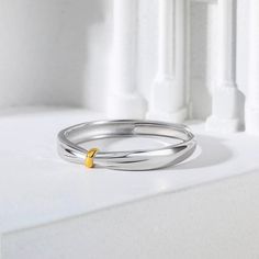 Confidently declare your love for her with this charming wedding band. Buffed to a brilliant luster, this wedding ring symbolizes your vow to honor and cherish her.Weight: 1.64 gWidth: 2.5 mmMaterial: 925 SilverPlating Color: Silver, Yellow Gold Minimalist Adjustable Promise Bands, Wedding Stackable Rings With Thick Band, Minimalist Promise Band, Elegant Thick Band Jewelry For Promise, Dainty Stackable Wedding Rings With Thick Band, Minimalist White Gold Couple Rings For Wedding, Classic Simple Promise Jewelry, Classic Simple Design Jewelry For Promise, Minimalist White Gold Wedding Couple Rings