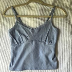 Never Worn Fitted Denim Blue Tank Top For Spring, Fitted Cotton Tank Top In Washed Blue, Fitted Washed Blue Cotton Tank Top, Trendy Washed Blue Tank Top For Spring, Fitted Washed Blue Tank Top For Summer, Fitted Light Wash Tank Top For Spring, Fitted Denim Blue Tops For Summer, Chic Blue Tank Top For Spring, Light Wash Cotton Tank Top For Spring