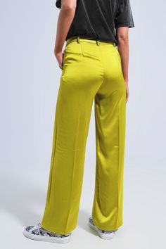 Full length. Pants. Shiny fabric. Relaxed fit. Wide leg. Casual. Belt loops. Glossy satin-style fabric . Side pockets . Zip fastening. Functional pockets. Spring Satin Straight Leg Pants, Chic Green Satin Bottoms, Wide Leg Satin Pants With Pockets, Satin Straight Pants With Pockets, Green Straight Dress Pants With Pockets, Green Dress Pants With Pockets, Satin Long Pants With Pockets, Straight Satin Pants With Pockets, Spring Satin Pants With Pockets