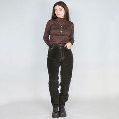 High Waisted Leather Pants! Vintage 80s Black washable suede straight leg Boyfriend fit pants by Skott's Suede. Super Heavy Industrial look and fit. Size marked a 28" but refer to measurementsWaist: 25"Hips: 35"Rise: 11 1/4"Inseam: 30 1/2" Vintage Fitted Leather Pants For Fall, Vintage High Waist Winter Pants, Vintage Straight Leg Leather Pants For Fall, Retro Corduroy Bottoms For Winter, Retro Corduroy Winter Bottoms, Retro Winter Corduroy Bottoms, Vintage Straight Leg Pants For Fall, Winter Retro Corduroy Bottoms, Vintage Tapered Leg Winter Pants