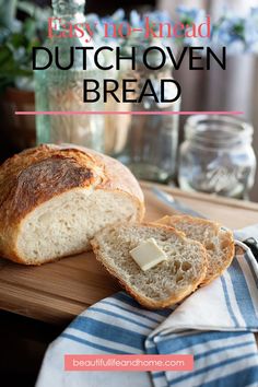 a loaf of bread sitting on top of a cutting board