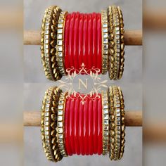 Fall In Love With Designer Indian Red Color Acrylic Base Chura Set. Simply Decorated With Plain Red Color Acrylic Bangles Along With Kundan Beaded Bangles & Kada At Both End. A Sober Creation To Make You Look Glowy On Any Celebration. This is a set of 24 Bangles (12 For Each Hand). Traditional Red Bangle For Wedding, Red Bangle For Wedding, Red Ceremonial Bangle For Festive Occasions, Ceremonial Red Bangle For Festive Occasions, Red Festive Bangle For Wedding, Red Wedding Bangle For Festive Occasions, Red Festive Wedding Bangle, Adjustable Red Bangle For Festive Occasions, Festive Red Wedding Bangle