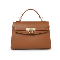 Inspired by Grace Kelly's enduring style, the Grace Top Handle Bag is meticulously crafted from premium USA full-grain textured calfskin leather, ensuring both durability and elegance. Its timeless and versatile design features a thoughtfully structured interior that comfortably accommodates all your everyday essentials. Whether day or night, you'll find yourself instinctively reaching for this chic and easy-to-wear masterpiece. Parisa Wang, The Grace, By Grace, Grace Kelly, Airport Style, Burgundy Color, Everyday Essentials, Handle Bag, Top Handle