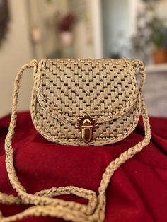 A very stylish bag with its useful and unusual form. You can use it day or night. The bag is croched of polyester macrame yarn and plastic canvas base * Strap: 120 cm , 47 in * 19x15x4,5 cm - 7,5x6x1,7 in * Metal  closure Beige Woven Party Bag, Elegant Woven Crochet Crossbody Bag, Beige Crochet Evening Bag With Braided Handles, Handheld Woven Crochet Bag As Gift, Handheld Crochet Bag For Gifts, Handheld Crochet Woven Bag Gift, Handwoven Crochet Shoulder Bag Gift, Beige Crochet Evening Bag, Handmade Gold Handheld Shoulder Bag