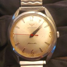 1950's Wittnauer Mens Automatic Watch Timepiece. My Father Owns This And Has Had It For Most Of His Life ; He's 82 Now. He Told Me It Has Never Stopped Working. It's Been In His Drawer Not Being Used For At Least 50 Yrs And It's Still Kickin!Kicking!! Definitely Quality At Its Finest! Vintage White Watch With Tachymeter, Vintage White Watch Accessories With Round Dial, Vintage White Round Dial Watch Accessories, Vintage White Automatic Watch Accessories, Vintage White Analog Watch, Retro White Watches For Formal Occasions, White Retro Watch For Formal Occasions, White Retro Formal Watch, White Retro Formal Watches