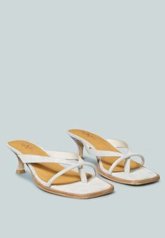 WINSLET Heeled Thong Sandal in Beige-Beige Beige Almond Toe Sandals With Wooden Heel, Almond Toe Sandals With Leather Sole, Leather Toe Post Flip Flops In Beige, Beige Leather Toe Post Flip Flops, Beige Toe Post Sandals With Removable Insole, Summer Sandals With Wooden Heel And Almond Toe, Beige Toe Post T-strap Sandals, Cream Leather Almond Toe Sandals, Cream Almond Toe Leather Sandals