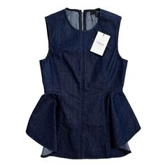 Theory Kalsing D Top Size: P/Xs Color: Dark Indigo Blue Design/Style: Fitted, Denim Knit, Ruffled Peplum Hem, Back Zip Closure, Higher Back Hem, Mid-Stretch Neckline: High Sleeves: Sleeveless Materials: 75% Cotton, 24% Poly, 1% Elastane Style #: G0204553 Measurements (Approximate And Taken Lying Flat) Chest: 15” Length: Front 25”/Back - 19” Condition: New With Tags, Excellent Condition. Dark Wash Sleeveless Casual Top, Spring Sleeveless Top In Dark Wash, Sleeveless Cotton Denim Top For Work, Dark Wash Sleeveless Top For Spring, Dark Wash Denim Sleeveless Tank Top, Trendy Sleeveless Denim Top For Spring, Dark Wash Denim Tank Top, Trendy Sleeveless Dark Wash Top, Trendy Dark Wash Sleeveless Top