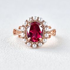 Antique Ruby & Pearl Ring Yellow Gold Women Delicate Lab Ruby Silver Ring, Vintage Ruby Engagement Ring, Art Deco Promise Ring Gift For Her *Primary Stone: Lab Created Ruby *Stone Color: Red *Stone Size: 5x7 mm *Stone Shape: Oval *Secondary Stone Type: Fresh Water Pearl *Stone Size: 2mm *Stone Color: White *Stone Shape: Round Features: * Handmade * Center Stone onyx * Brand New * All Ring Sizes Available * Suitable For Every Day * 14k Solid Gold / 18k Solid Gold / Gold Filled Over Sterling Silve Handmade Elegant Ruby Wedding Ring, Elegant Red Pearl Ring For Anniversary, Elegant Birthstone Rings For Jewelry Making, Ruby Engagement Ring Vintage, Ruby Silver Ring, Diana Ring, Engagement Ring Art Deco, Pearl Stone, Promise Ring Gift