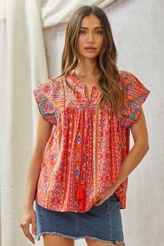 Savanna Jane Aztec print blouse, featuring embellished embroidery all over front and tassel ties. Non sheer. Notched neckline. Short sleeves. Super pretty! Color: RedSizes: S-M-L-XL Bust 36-38-40-42, Length 26-28100% Polyester, hand wash cold, imported A2/T10216-2 Embellished Embroidery, Aztec Shorts, Print And Embroidery, Notched Neckline, Sunflower Art, Cute Blouses, Embroidery Blouse, Boutique Brands, Aztec Print