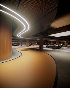 an empty parking garage with several cars parked in the lot and lights shining on the ceiling