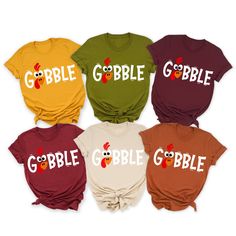 Gobble Gobble Thanksgiving Family Shirts, Turkey Shirt, Friendsgiving Shirts, Turkey Face, Thanksgiving 2022, Happy Turkey Day * Our unisex cozy shirts are soft and durable!  * Ships in 1 Business Day! * Shop with Confidence! We are a 5-Star Rated Shop operating since 2015! * Easy measuring tip: Take your favorite sweatshirt or tee, lay it on a flat surface and measure the width (armpit to armpit) and length (top to bottom), then compare with our size chart!  * Unisex, classic fit, preshrunk, po Diy Turkey Shirts For Kids, Work Thanksgiving Shirts, Thanksgiving Shirts For Teachers, Turkey Shirts Women, Thanksgiving Shirt Ideas Vinyl, Thanksgiving Tshirt Designs, Thanksgiving Family Tshirts, Thanksgiving Tshirt Ideas For Family, Turkey Tshirts