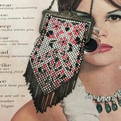 an advertisement featuring a woman's purse with beads and pearls on the front cover