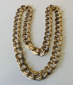 "This classic silver tone necklace is in wonderful condition. The necklace features shiny double chain links. The necklace is 24 inches long and 5/8\" wide. It has a super sturdy clip clasp. This is on the heavy side. The necklace can probably be shined with silver pooling or toothpaste to brighten it further. It has some burnishing. I specialize in finding fun wearable jewelry. Please browse my shop for more options. I box jewelry sales in new gift boxes. I often combine multiple item purchases Vintage Oval Link Chunky Chain Necklace, Vintage Chunky Chain Necklace With Oval Links, Vintage Chunky Chain Oval Link Necklace, Vintage Chunky Oval Link Chain Necklace, Vintage Style Chunky Link Chain Necklace, Vintage Chunky Link Chain Necklace, Vintage Silver Link Chain Necklace, Vintage Oval Link Curb Chain Necklace, Vintage Curb Chain Necklace With Oval Links