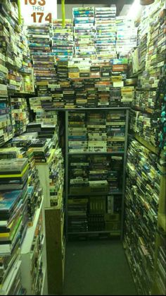 a room filled with lots of dvd's and dvds