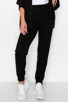 Made for active or relaxed days, these high rise relaxed joggers are the newest style added to our loungewear collection. Featuring a high-rise elasticized waistband with a drawstring detail, two pockets on each hip and cuffed hems, you’re going to love these full length loungewear joggers . High rise elasticized waistband Drawstring feature Two pockets on each hip Ultra-soft knit fabric with stretch 62% Polyester, 33% Rayon, 5% Spandex Imported Model StatsHEIGHT: 5'5" BUST: 32WAIST: 25.5HIPS: 3 Sporty Joggers With Functional Drawstring, Solid Color Activewear With Drawstring Long Pants, Solid Color Long Pants Activewear With Drawstring, Athleisure Jogging Pants With Drawstring, Athleisure Joggers With Functional Drawstring, Solid Color Sportswear Bottoms With Drawstring, Solid Sportswear Bottoms With Drawstring, Solid Color Activewear With Drawstring For Jogging, Trendy Leisure Joggers With Drawstring