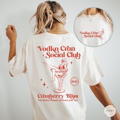 Embrace our Vodka Cranberry shirt! This tee is perfect for anyone who loves cocktails or appreciates aesthetic shirts! Treat yourself or surprise a friend with this thoughtful gift!  👕 COMFORT COLORS 1717 T-SHIRT The Comfort Colors 1717 garment-dyed unisex t-shirt is made with medium fabric consisting of high quality, 100% ring-spun US cotton for long-lasting comfort. All shirts feature pre-shrunk cotton for size retention and a signature sewn-in twill label. 👕 SIZING & CARE Shirt runs true to size. If you prefer an oversized fit, we recommend sizing up. For the desired oversized look, we personally suggest sizing up 2-3 sizes. We recommend washing inside out in cold water with like colors. Tumble dry on low or air dry for the best results.  🖨️ PRINTING PROCESS Direct-to-garment printin Vodka Cran, Cocktail Tshirt, Vodka Cranberry, Bachelorette T Shirt, Cranberry Vodka, Vodka Cocktail, Bachelorette Tshirts, Bachelorette Gift, Custom Cocktails