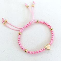 New. Stainless Steel Puffed Heart Ajustable Knotted Bracelet. Color Pink. Handmade With 6mm Golden Stainless Steel Beads Enclosed With Knots On A Braided Cord Creating A Stylish Design. A Focal Stainless Steel Puffed Heart Is The Star Of This Bracelet. Adjustable With Macrame Sliding Closure. Wear It Alone Or Create Stacks Combinations With More Bracelets. Perfect Gift For Valentines Day, Mother’s Day, Christmas, Birthdays, Anniversaries Or Simply For Yourself. Braided Bracelets With Beads, Bracelets Business, Coquette Bracelet, Mexican Bracelets, Knot Bracelets, Fork Bracelet, African Bracelets, Chalcedony Bracelet, Knotted Bracelet