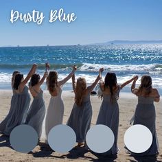 four girls on the beach with their arms in the air and text that says dusty blue