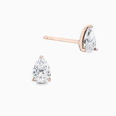 A sight to behold, these Pear-Cut Diamond Stud Earrings draw inspiration from the splendour of old-world elegance. Each ethical diamond is adorned with utmost care and attention by Ecksand's team of highly skilled craftspeople for a mesmerizing result that stays true to its promise to last forever. Accent diamonds: 0.70+ ctw, VS2+/F+Setting: Prongs settingPost Length: 11 mm approx.Backing: Butterfly push backs Classic Pear Shaped Diamond Earrings, Timeless Diamond White Pear-shaped Earrings, Diamond White Pear-shaped Timeless Earrings, Classic Pear-shaped Yellow Gold Diamond Earrings, Classic Pear-shaped Diamond White Earrings, Classic Pear-shaped Diamond Earrings With Accents, Classic Pear-shaped Diamond Earrings, Classic Pear-shaped White Diamond Earrings, Rose Gold Pear-shaped Diamond Earrings