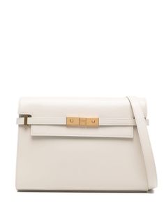 cream leather engraved logo clasp fastening gold-tone hardware foldover top main compartment single shoulder strap Classic Cream Flap Bag With Gold-tone Hardware, Elegant Cream Flap Bag With Gold-tone Hardware, Classic Office Shoulder Bag With Gold-tone Logo Plaque, Classic White Shoulder Bag With Turn-lock Closure, Classic White Shoulder Bag With Gold-tone Logo, Timeless Rectangular Shoulder Bag With Gold-tone Logo, Luxury White Shoulder Bag With Turn-lock Closure, Elegant Crossbody Flap Bag With Gold-tone Logo Plaque, Elegant Shoulder Bag With Gold-tone Logo For Business