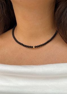 Simple and classy beaded necklace with obsidian stones. LENGTH: 35 cm + 5 cm chain. CLOSURE: lobster claw. MATERIALS: obsidian beads, stainless steel. You might also like chain necklace with heart from the photo: https://www.etsy.com/listing/1666110790/dainty-chain-heart-pendant-choker?click_key=56d472b5755c79254c3b713d7e2fd7b3b59bd052%3A1666110790&click_sum=ae83057b&ref=shop_home_active_1&pro=1 PLEASE NOTE, COLORS might be different because of the nature of stone and your monitor! Pleace, note Choker Necklace Black, Chain Heart, Black Choker Necklace, Obsidian Stone, Pendant Choker, Dainty Chain, Beaded Accessories, Necklace Black, Shop Home