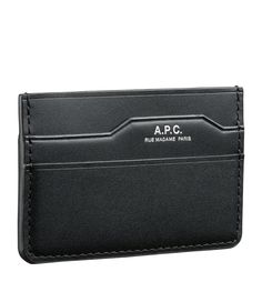 A.P.C. Men's cardholder.- Smooth vegetable-tanned leather.- Three slots for cards, one with a notch like a folder.- A.P.C. logo embossed in silver. Black Wallets With Engraved Logo For Everyday Use, Leather Card Holder With Id Window For Formal Use, Formal Leather Card Holder With Id Window, Modern Business Card Holder With Coin Pocket, Modern Card Holder With Card Slots, Formal Rectangular Card Holder With Engraved Logo, Rectangular Card Holder With Engraved Logo, Everyday Rectangular Card Holder With Engraved Logo, Modern Business Card Holder With Card Slots