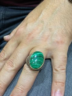 Men Handmade Ring , Malachite Gemstone Ring , Oval Gemstone Ring , Embroidered Ring , Ottoman Jewelry , 925k Sterling Silver Ring . Sent in Gift Package. ★Item Details * Gender : Male / Female * Material : 925K Sterling Silver * Gemstone : Malachite Ring * Total weight : 19 Grams * Stone Size 18x25 mm ✔ Ready to Ship in 1-2 Business Days .. ✔ Shipped to the Worldwide 1-5 business days with free shipping... ✔ The product will be sent to you with a handmade wooden box to avoid any damage during sh Spiritual Oval Engraved Ring With Gemstone, Spiritual Oval Engraved Gemstone Ring, Spiritual Oval Gemstone Engraved Ring, Oval Malachite Emerald Ring, Traditional Handmade Oval Signet Ring, Traditional Oval Emerald Ring, Traditional Oval Signet Ring With Polished Finish, Traditional Oval Rings With Polished Finish, Embroidered Ring