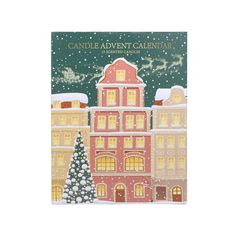 a christmas card with an image of a building in the snow and a lit tree