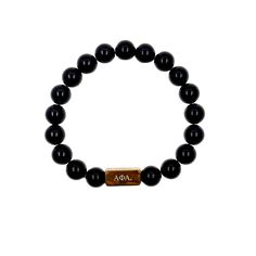 Make a lasting impression with the Alpha Phi Alpha Fraternity Custom Bead Bracelet! Crafted from high-quality Onyx stone and 18K gold plated stainless steel decorative balls, this elegant piece of jewelry is sure to get you noticed. Its tarnish-free and waterproof design makes it durable enough for everyday wear. Plus, it features a beautiful gold plated bar that is engraved with the iconic Alpha Phi Alpha Greek letters — adding the perfect finishing touch to your look. Choose between three uniq Classic Stretch Bracelet With Polished Beads As Gift, Classic Stretch Bracelet With Polished Beads For Gift, Minimalist 8mm Onyx Bead Jewelry, Hand-strung Onyx Bracelets As A Gift, Elegant Personalized Stretch Bracelet With Round Beads, Elegant Adjustable Name Bracelet With Round Beads, Elegant Personalized Black Beaded Bracelet, Elegant Bracelets With 8mm Beads As A Gift, Modern Stretch Bracelet With Round Beads As Gift