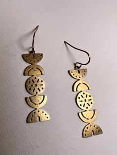 "Raw brass , BOHO style earrings. Great for everyday use. *Dimensions* 1.34\"x0.38\"x0.03\" 33.93mm x 9.73mm x 0.75mm Weight: approximately 0.04 oz for a pair The jewelry comes with a silk pouch that you can store it. The pouch is made by embroidery silk fabric from India , up cycled from saris, colors various. If you have any problems after receiving the products, please feel free to contact me. I will give you a best solution. *Returns and exchanges * I gladly accept returns, exchanges, and cancellations. Just contact me within 3 days of delivery. Request a cancellation within 1 hour of purchase. *Conditions of return * Buyers are responsible for return shipping costs. If the item is not returned in its original condition, the buyer is responsible for any loss in value. Please contact me Boho Style Earrings, Boho Stil, Style Earrings, The Pouch, Style Boho, Raw Brass, Boho Earrings, Designer Earrings, Silk Fabric