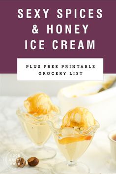 two glasses filled with ice cream on top of a marble counter next to nuts and honey