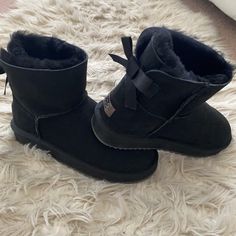 Condition: Brand New Color: Black Size: 8 Description: Nk2005 Mini Bailey Bow Corduroy (Black), Brand New Ugg. Was Bought In Australia. 100% Australian Wool. Comes With Dust Bag (Box Is Not Included) Item: Nk2005 Original Price: $470 Black Uggs With Bows, Outfits With Black Uggs, Black Bailey Bow Uggs, Black Uggs Outfit, Ugg Black Boots, Uggs Mini, Ugg Mini Boot, Pretty Slippers, Uggs Black